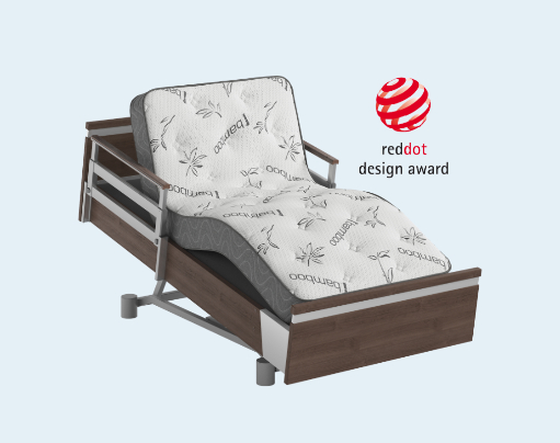 A bed with a red design logo on it.