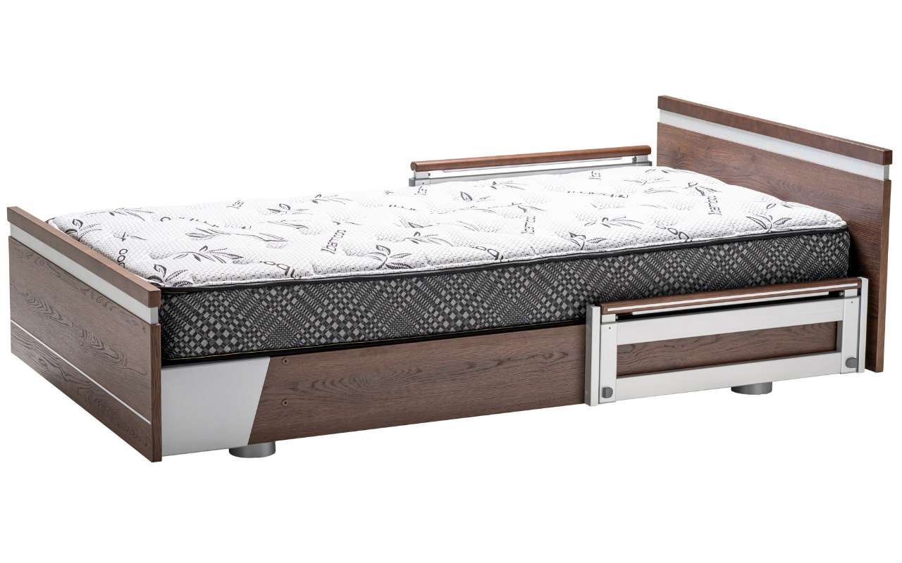 A single bed with a wooden frame and metal accents, featuring a floral-patterned mattress and storage drawers underneath.